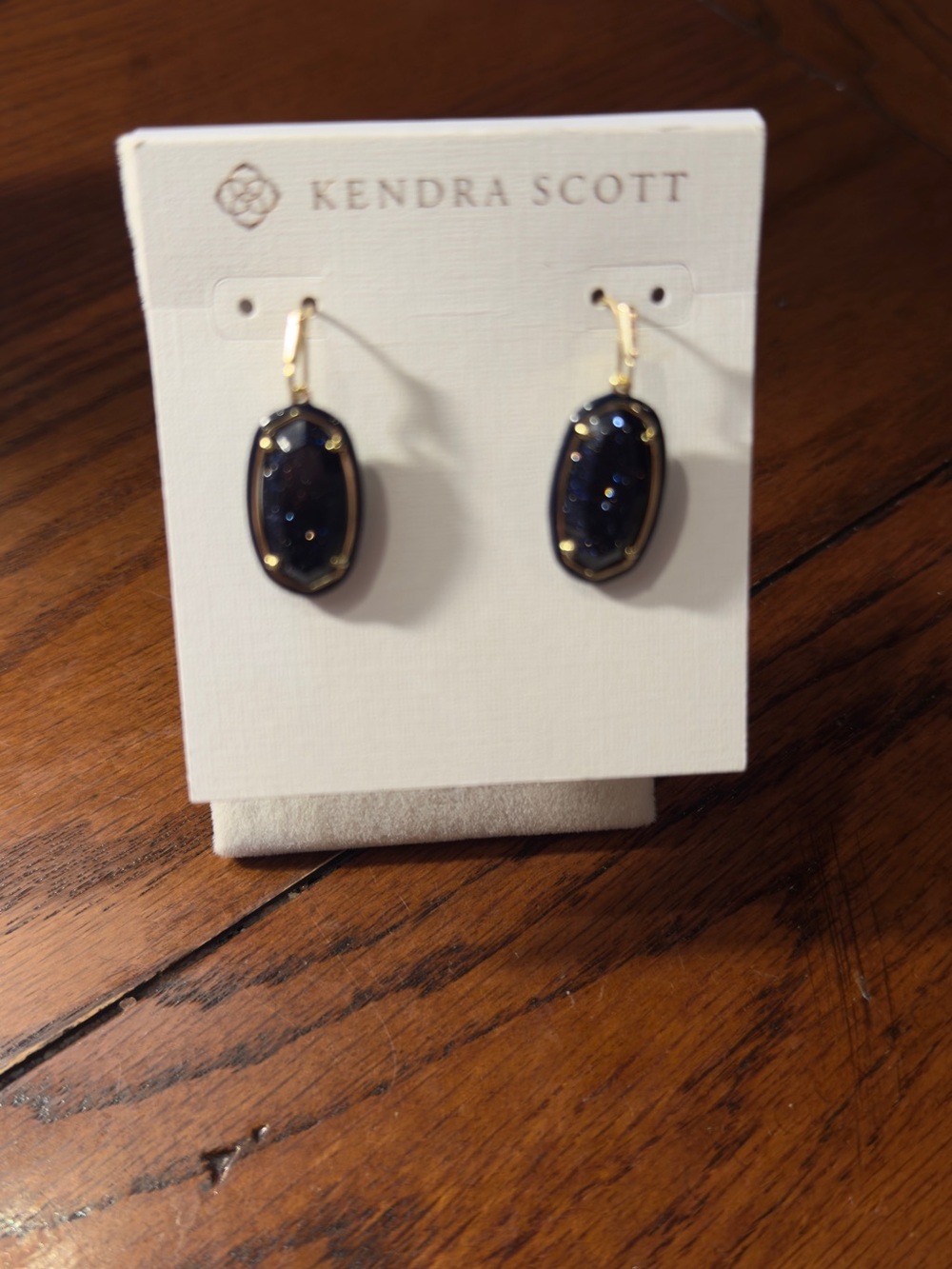 Kendra Scott Gold Drop Earrings with Sparkling Navy Stones